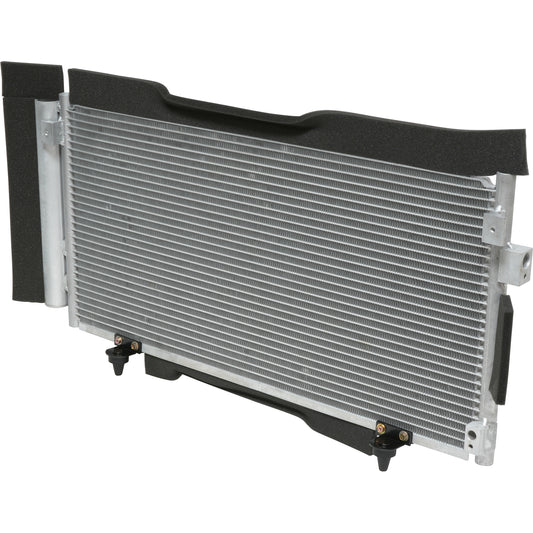 Condensador de flujo paralelo con secador incorporado